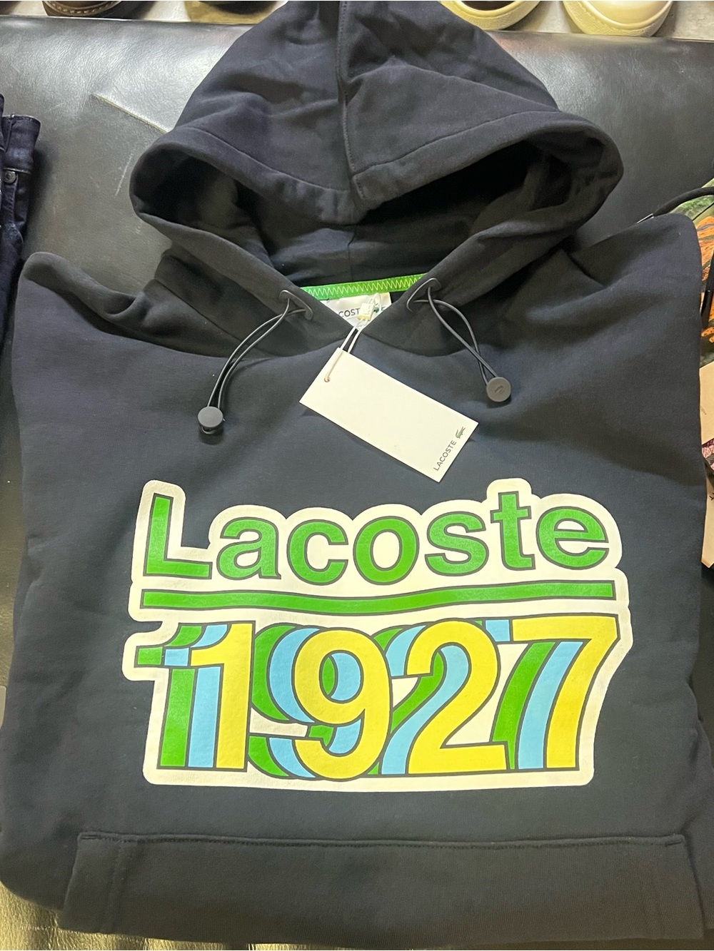 Lacoste Black Hoodie with Green & Yellow 1927 Graphic